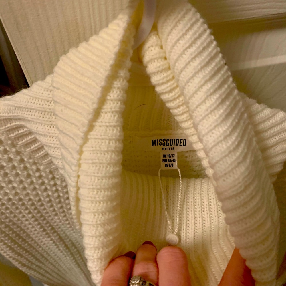 Turtleneck dress/long sweater. Dress up or down